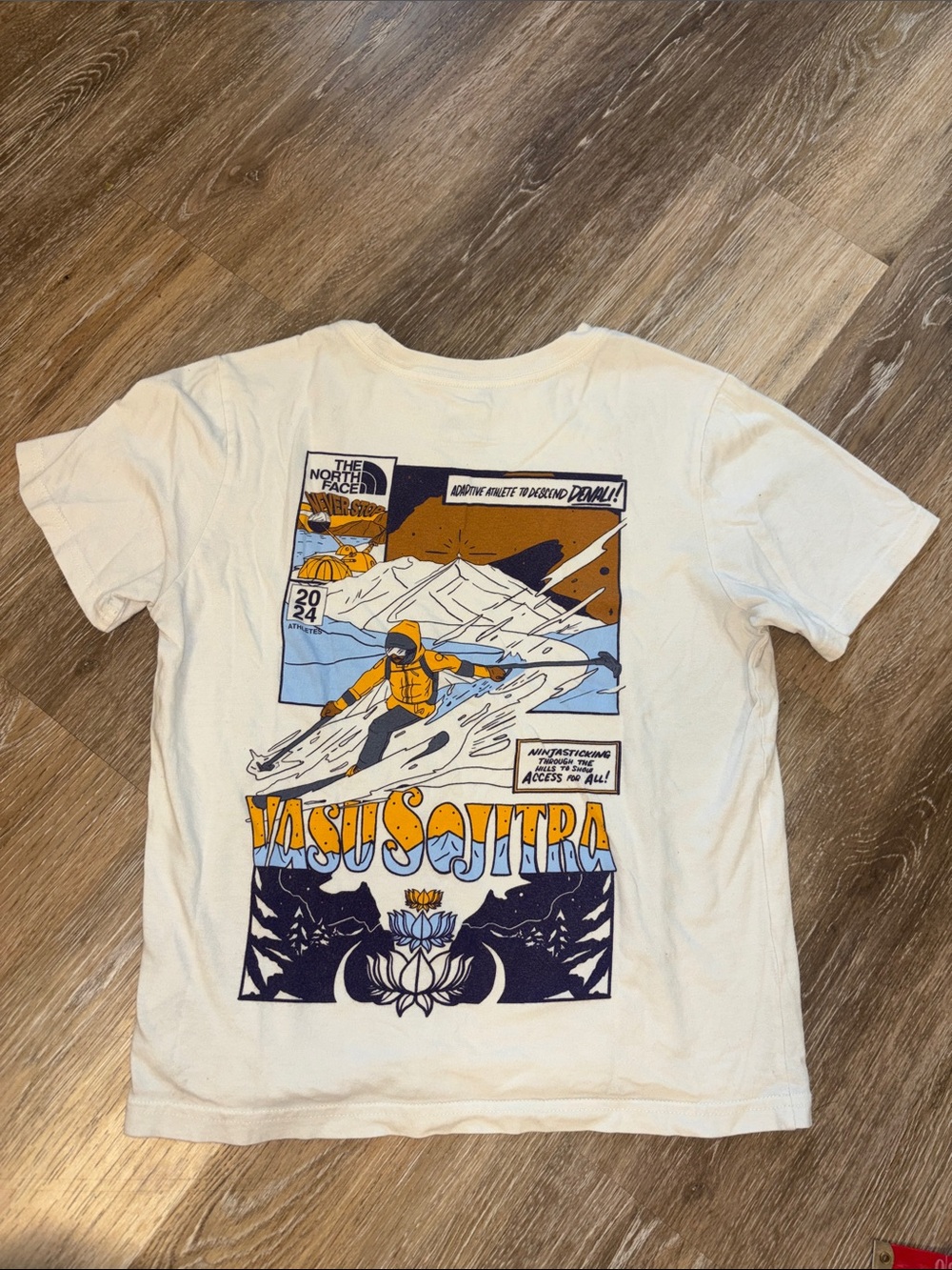 The North Face White Graphic Short Sleeve Tee with Blue & Orange Print